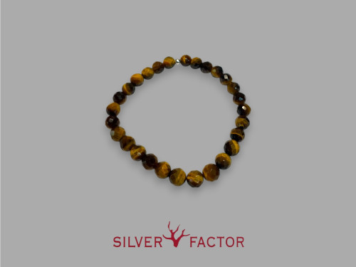 PUL.OJO TIGRE 6mm FACETADA AG. ELASTICA